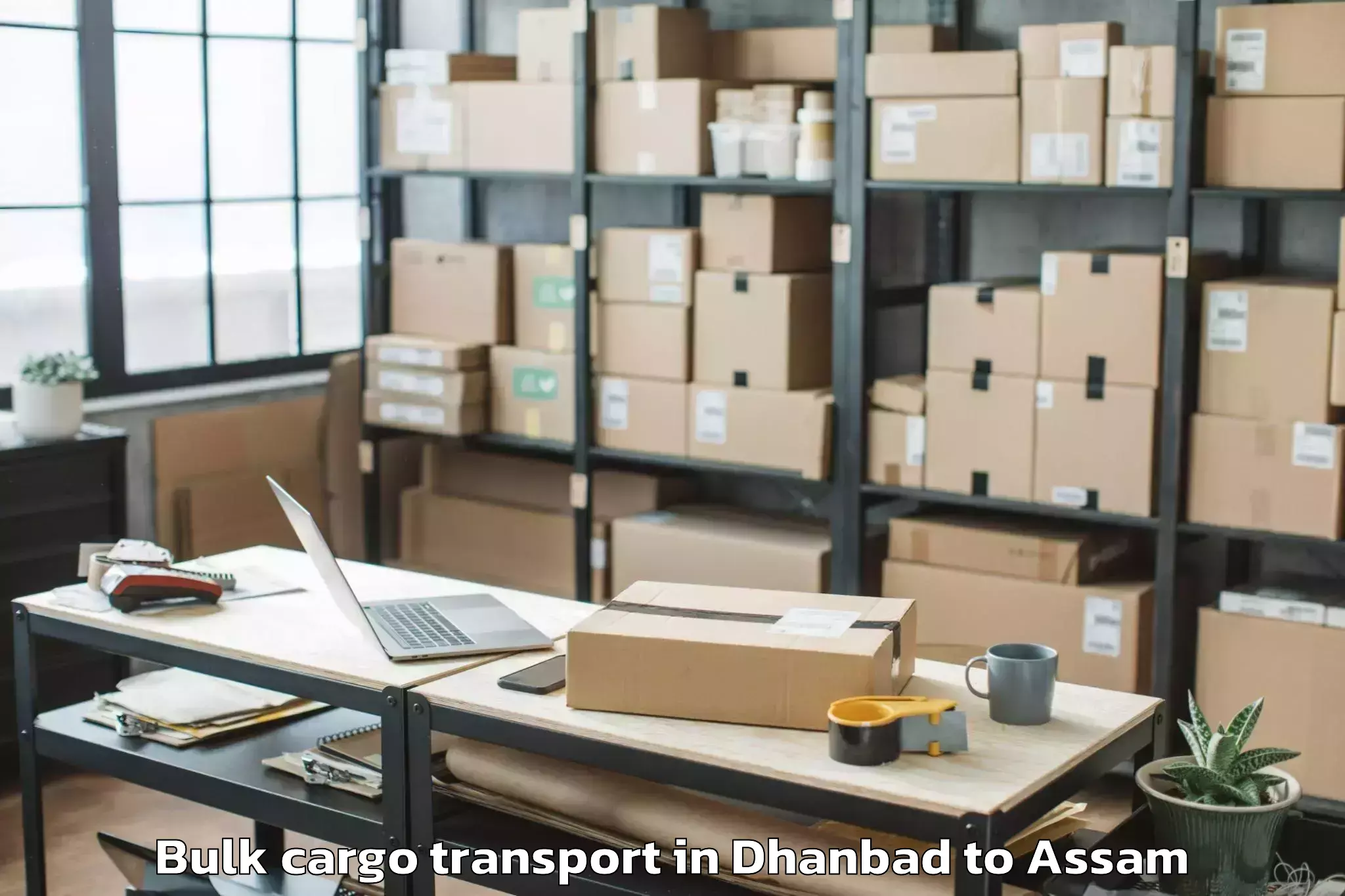 Book Dhanbad to Rangapara Bulk Cargo Transport Online